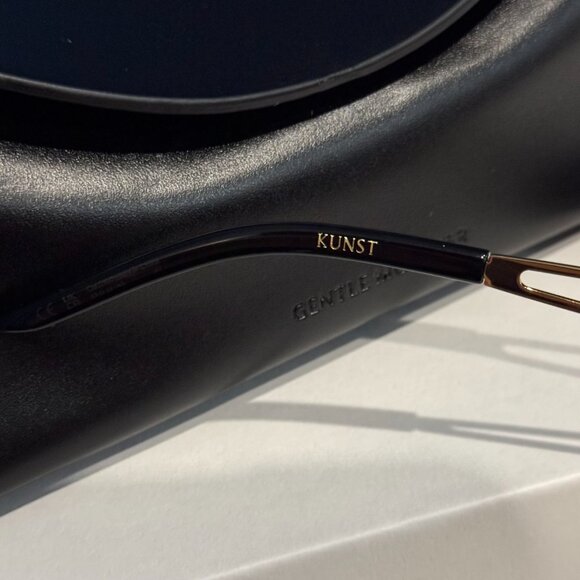 Gentle Monster Designer Oval Black Sunglasses Minimal Luxury Look